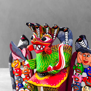 Close up detail of the intricate carvings on a Traditional 18 Sanni Mask