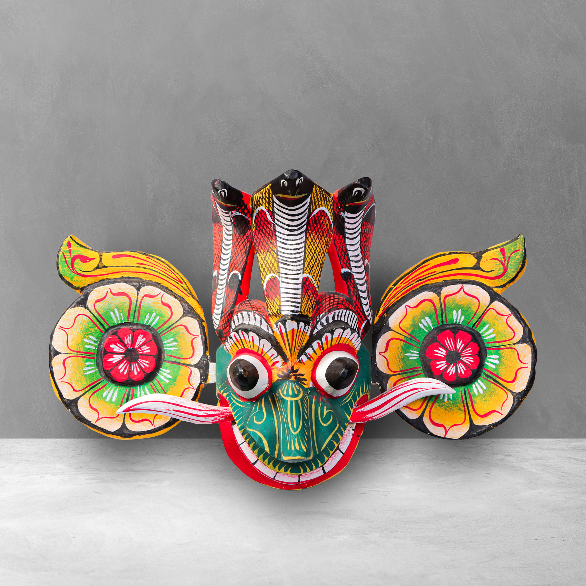 Front view of a colorful 8 inch Front view of a 8 inch Traditional Gara Mask