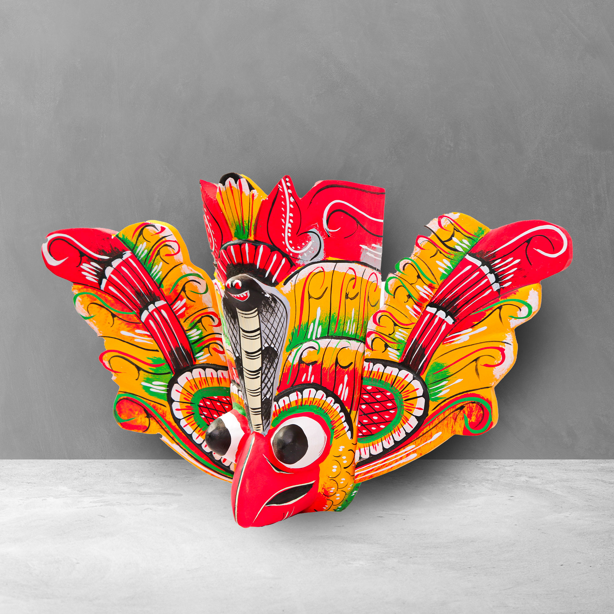 Side angle of a hand carved Traditional Gurulu Mask