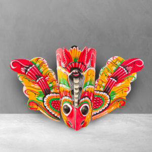 Front view of a colorful 8 inch Traditional Gurulu Mask