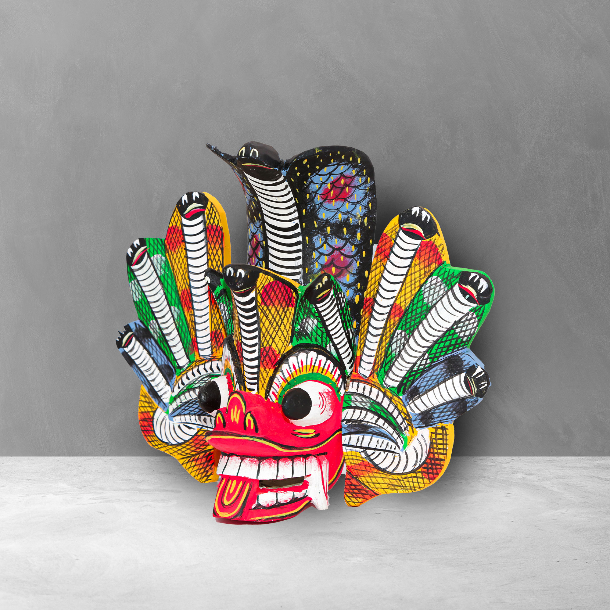 Angled view of a hand carved Traditional Naga Mask