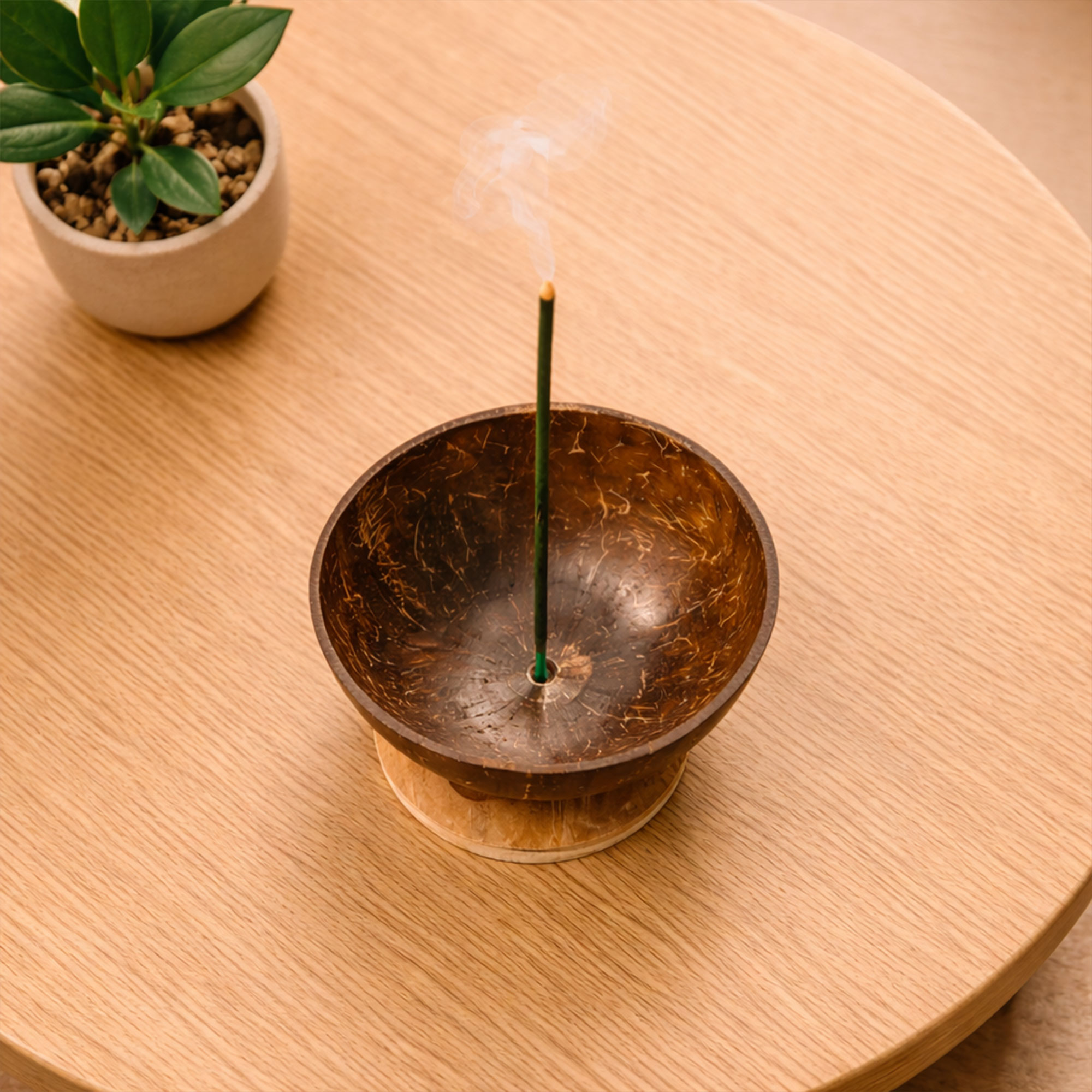 Top down view of a Handmade Coconut Shell Incense Stick Holder