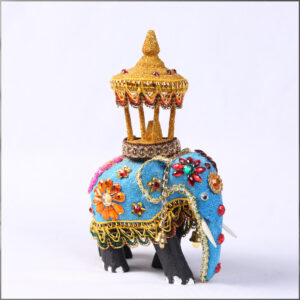 Angled view of a Wooden Decorated Elephant with Casket