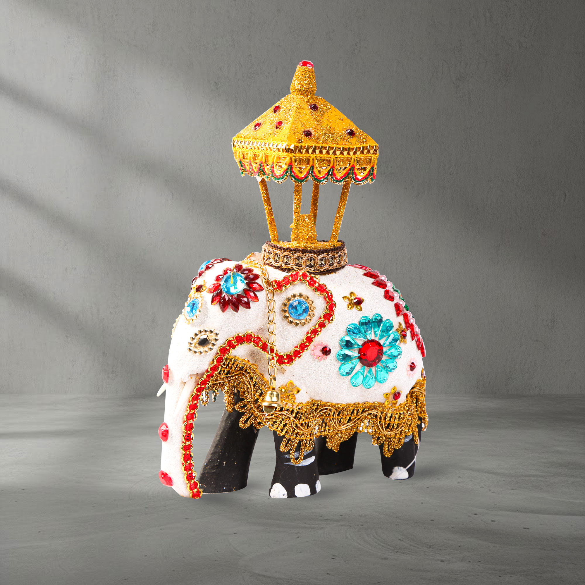Angled view of a Wooden Decorated Elephant with Casket