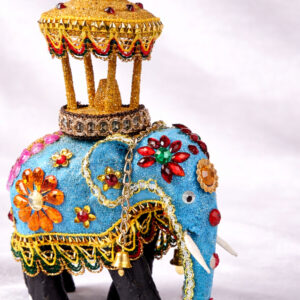 Close up view of a Wooden Decorated Elephant with Casket