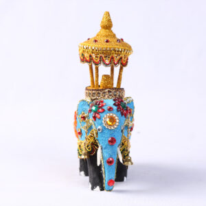Front view of a Wooden Decorated Elephant with Casket
