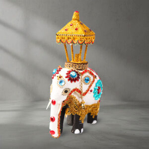 Front view of a Wooden Decorated Elephant with Casket